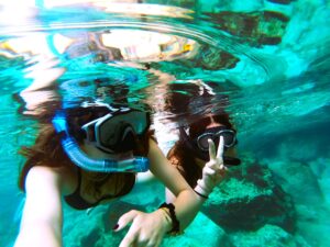 Snorkeling in the crystal-clear waters of the Blue Lagoon Malta
