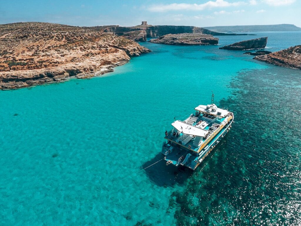 Gozo and Blue Lagoon Day Trip featuring crystal-clear turquoise waters and scenic coastal views in Malta.