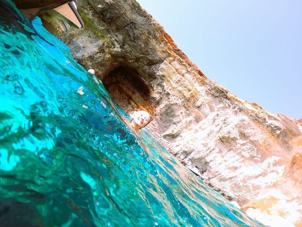 traveller swimming at crystal lagoon malta