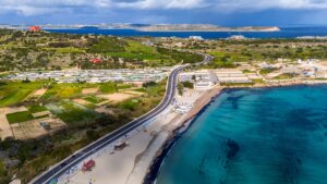 Scenic view of Ghadira Bay Malta with crystal-clear turquoise water and sandy beach