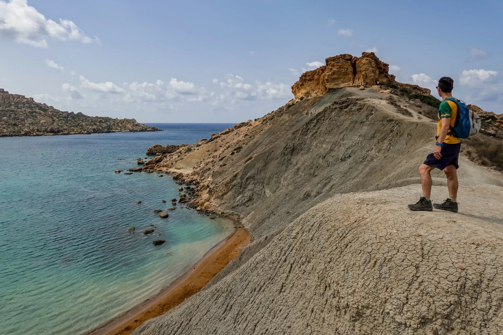 Scenic coastal hiking trail starting from Golden Bay Malta with views of cliffs and the Mediterranean Sea