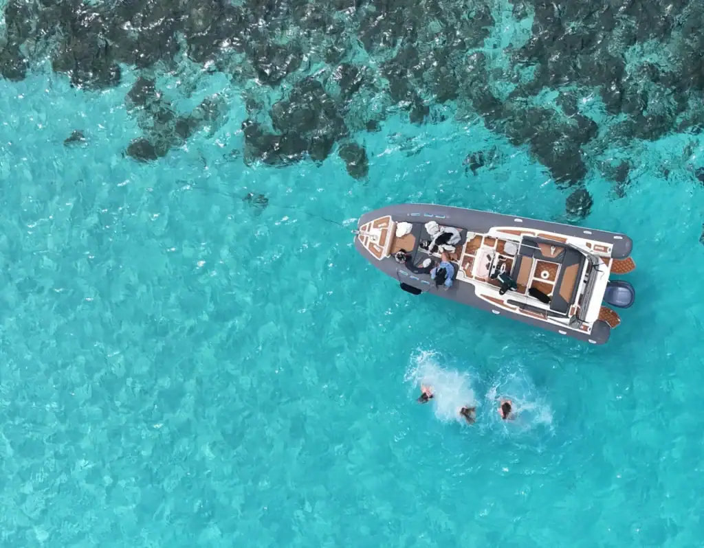 GOZOblu Private Boat Tour cruising from Valletta to Blue Lagoon, showcasing clear turquoise waters and scenic coastal views in Malta.