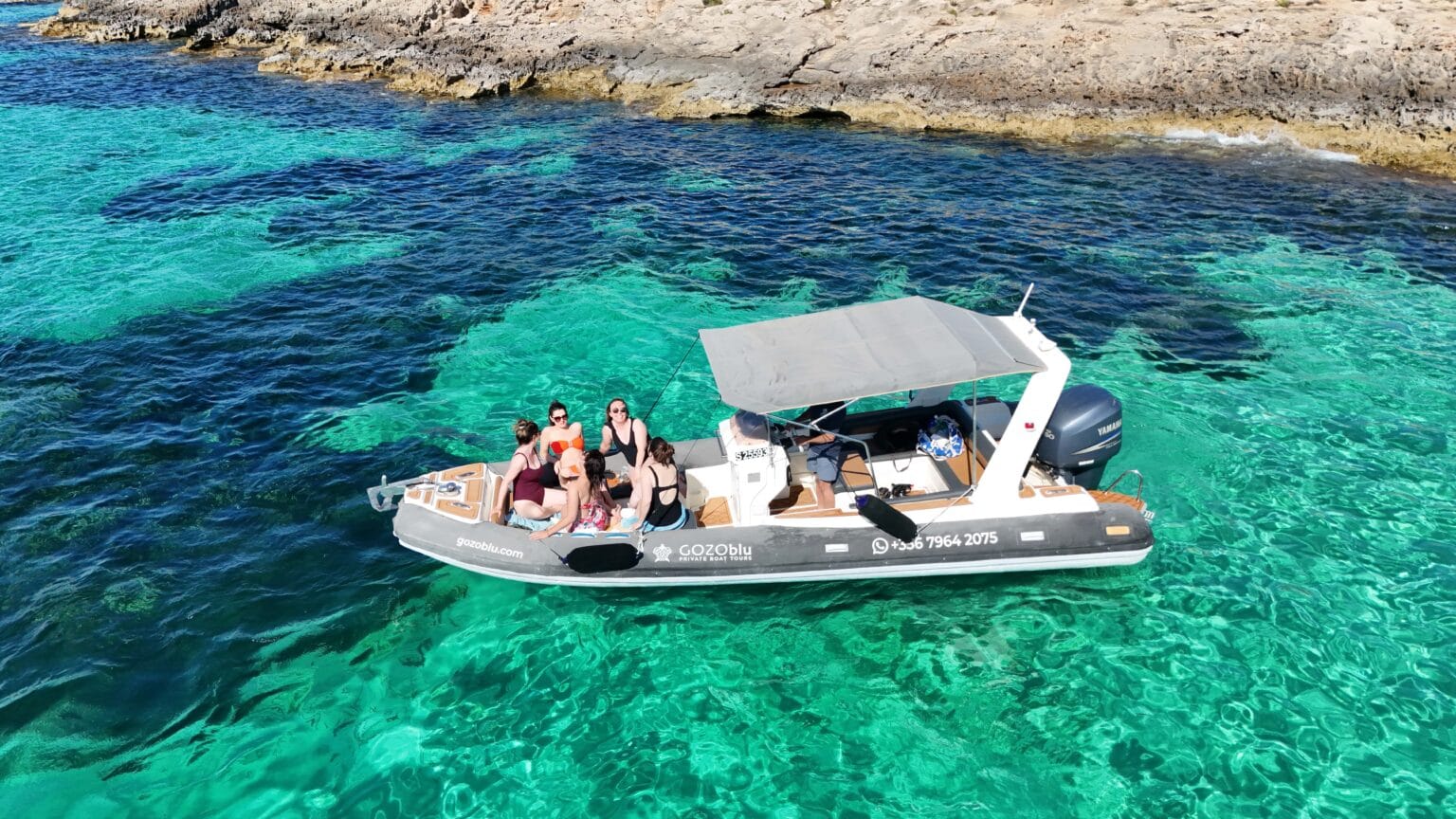 Scenic Malta private boat tour with GOZOblu, showcasing crystal-clear waters, hidden coves, and a luxurious experience around Comino and the Blue Lagoon.
