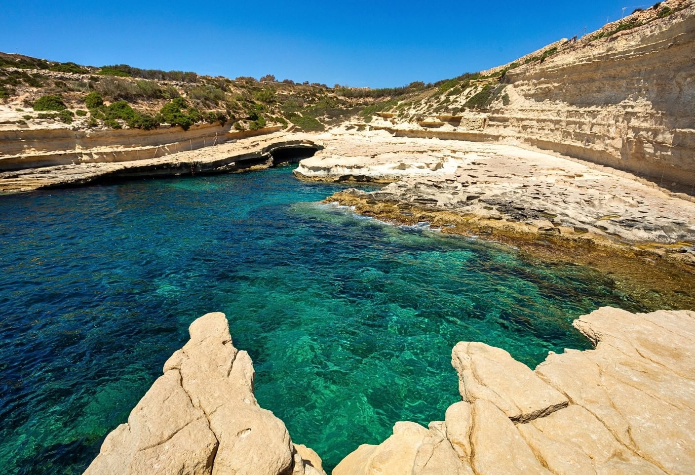 St Peters Pool Malta, a popular swimming and sunbathing spot near Marsaxlokk