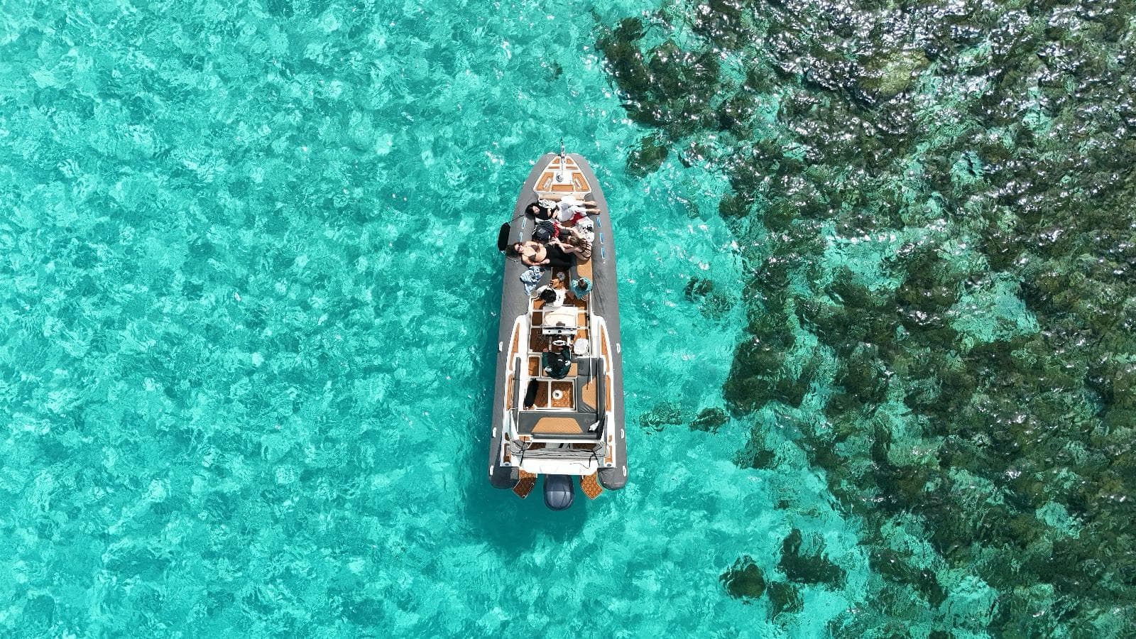 GOZOblu Private Boat Tours cruising on clear turquoise waters — the best way to get to blue lagoon in comfort and style.