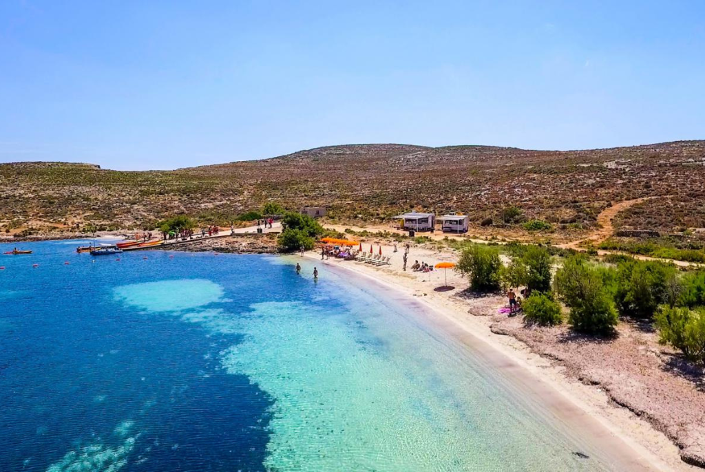Santa Maria Bay, one of the best beaches in Malta best experienced by boat