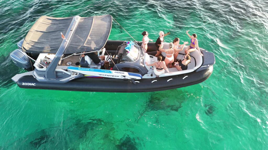A group of friends enjoying a private boat charter in Malta with GOZOblu