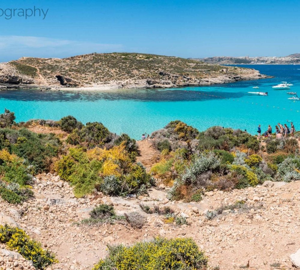 photography Stunning photography shots of Comino, Malta, featuring crystal-clear blue waters and dramatic limestones