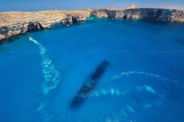 P31 wreck The P31 wreck at Comino resting on the seabed, showcasing one of the most fascinating Malta diving spots for underwater photography and exploration.